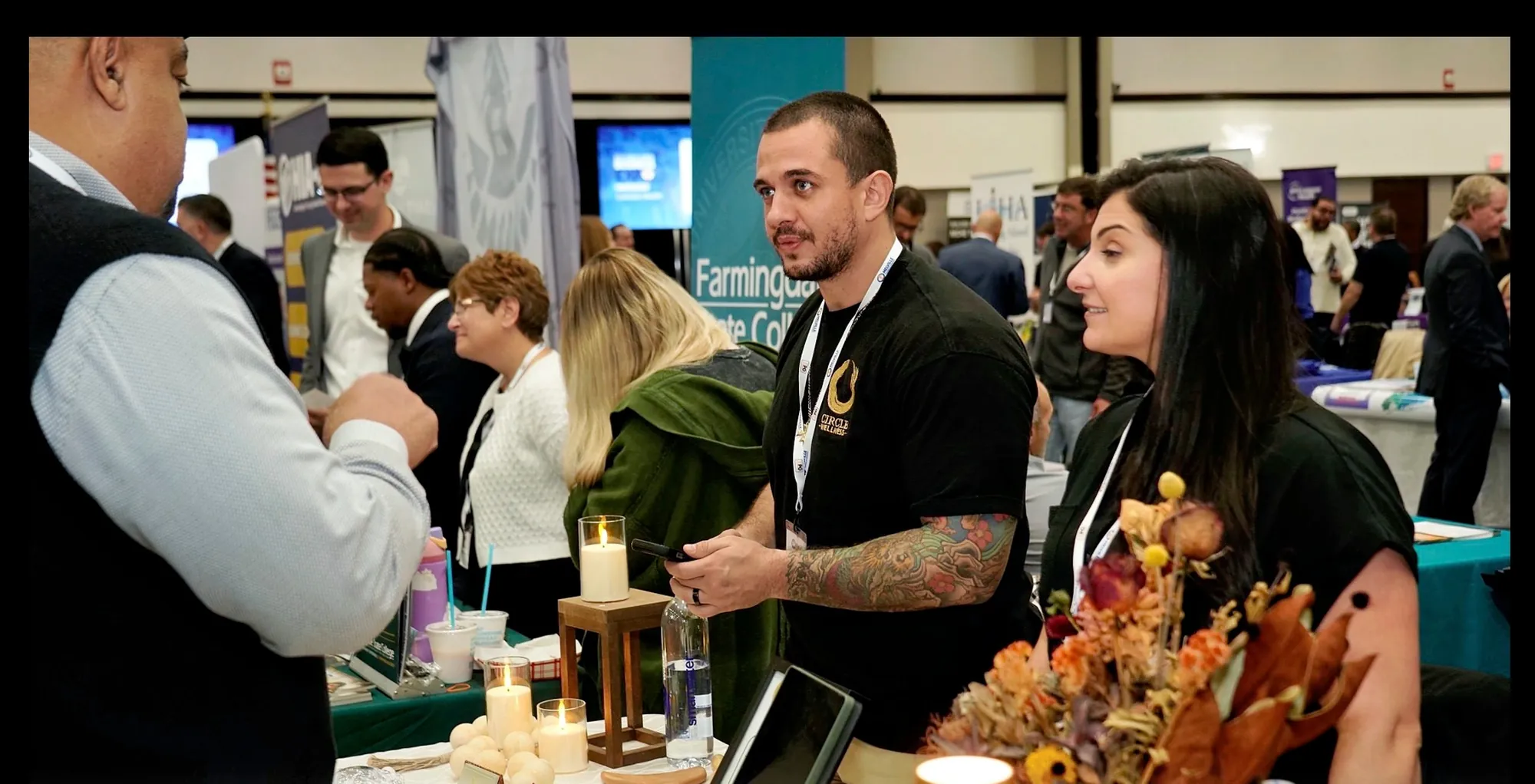 Members of the Melville Chamber of Commerce networking on the floor of the 2025 Business Expo