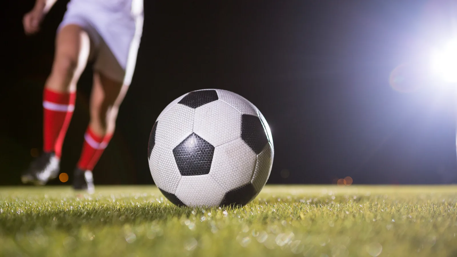 A soccer stadium at night